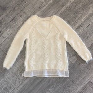White fuzzy sweater